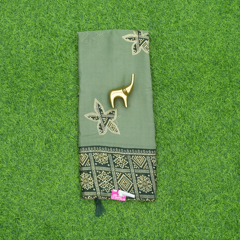 Green and Bottle Green Color Saree With Embroidered Geometric Border