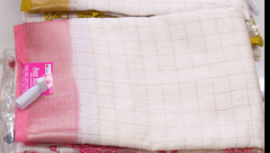 Cream and Pink Color Traditional Zari Border Fancy Saree